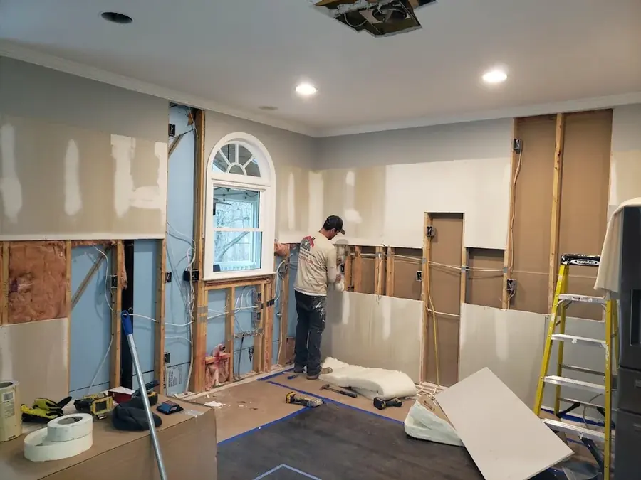 A wall opened to the studs to dry a leak in a North Dallas property