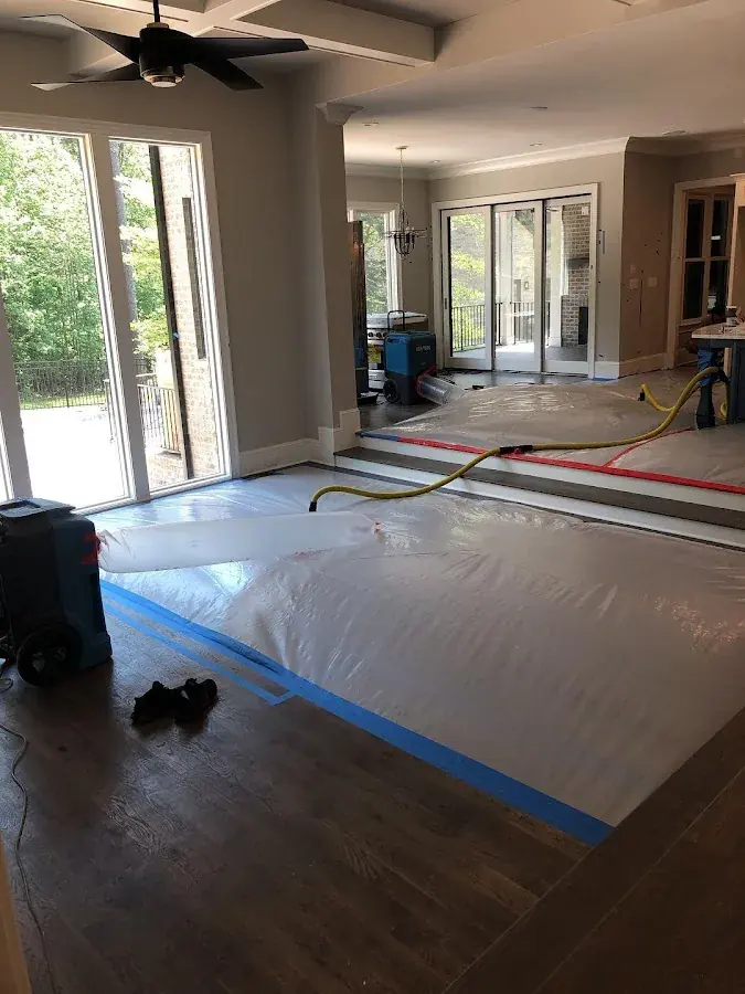 Containment and drying set up in a living area in a North Dallas property